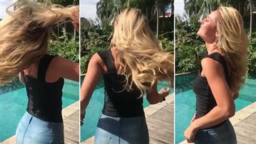 Paolla Oliveira "bate cabelo" à beira da piscina: "Bota a cara no sol, mona"