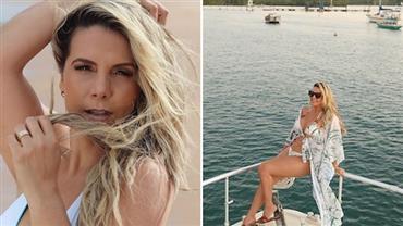 Aos 41 anos, Carla Perez ostenta corpão de biquíni em passeio de barco na Bahia