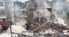 Avião militar cai sobre área residencial na China